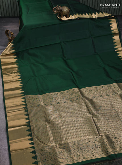 Pure kanchipuram silk saree bottle green with plain body and temple zari woven border