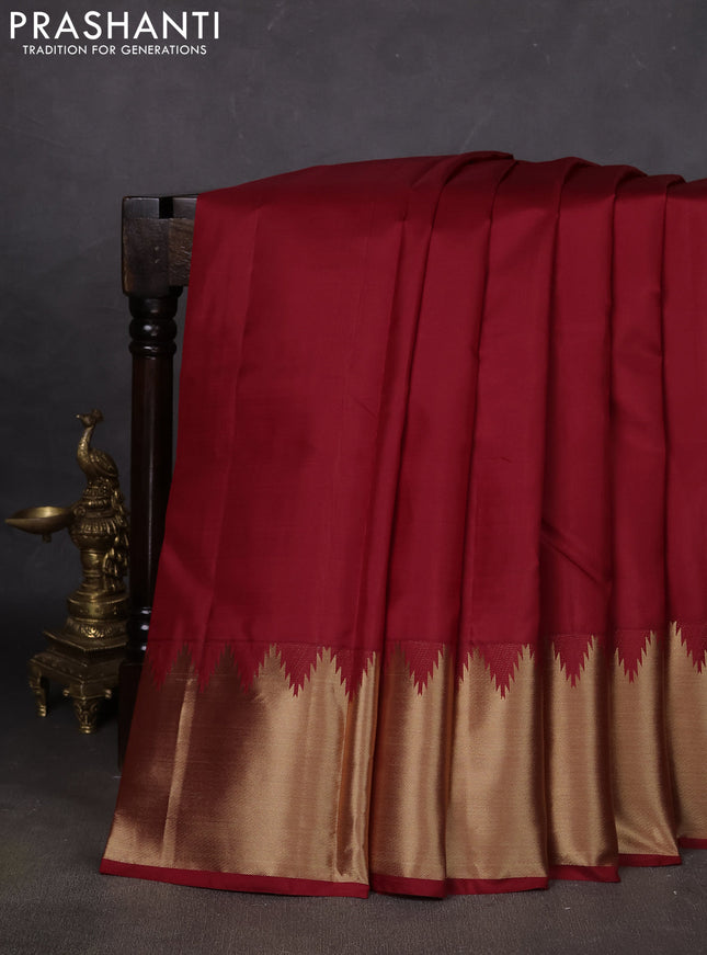 Pure kanchipuram silk saree maroon with plain body and temple zari woven border
