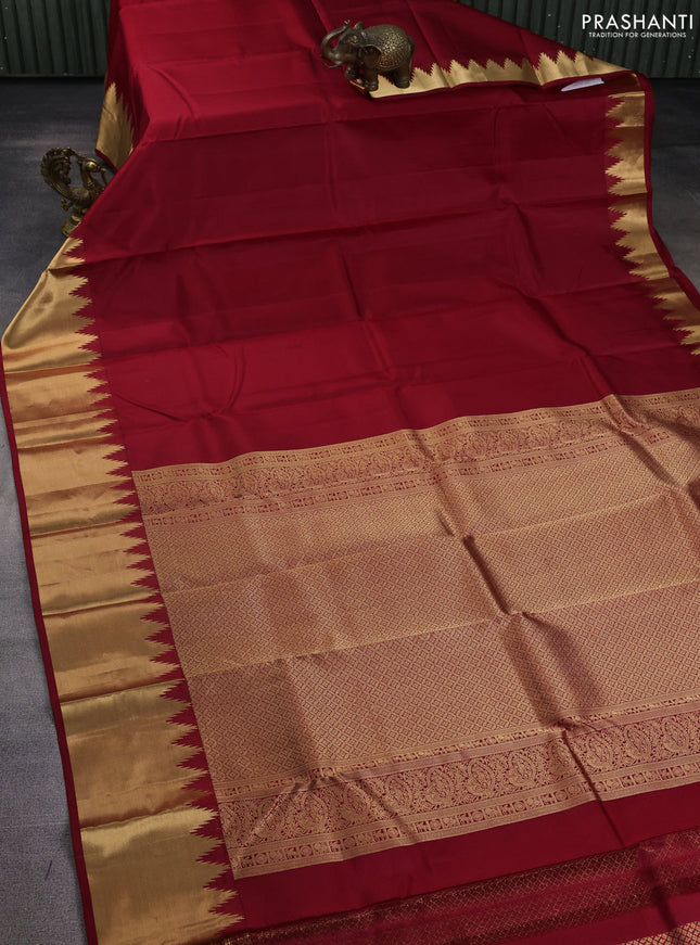 Pure kanchipuram silk saree maroon with plain body and temple zari woven border