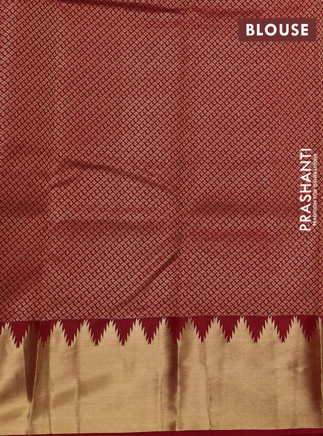 Pure kanchipuram silk saree maroon with plain body and temple zari woven border