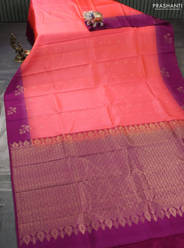Pure kanchipuram silk saree peach shade and purple with zari woven buttas and zari woven butta border
