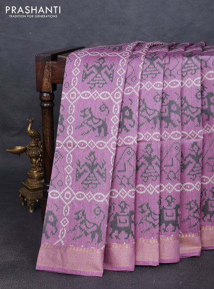 Munga tussar silk saree pastel purple with allover patola prints and zari woven border