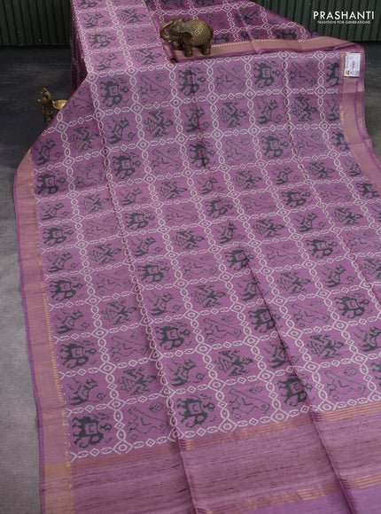Munga tussar silk saree pastel purple with allover patola prints and zari woven border