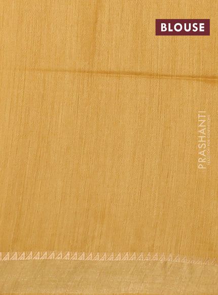 Munga tussar silk saree mustard yellow with allover patola prints and zari woven border