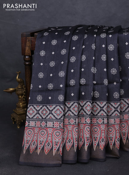 Munga tussar silk saree black with allover butta prints and ajrakh printed pallu