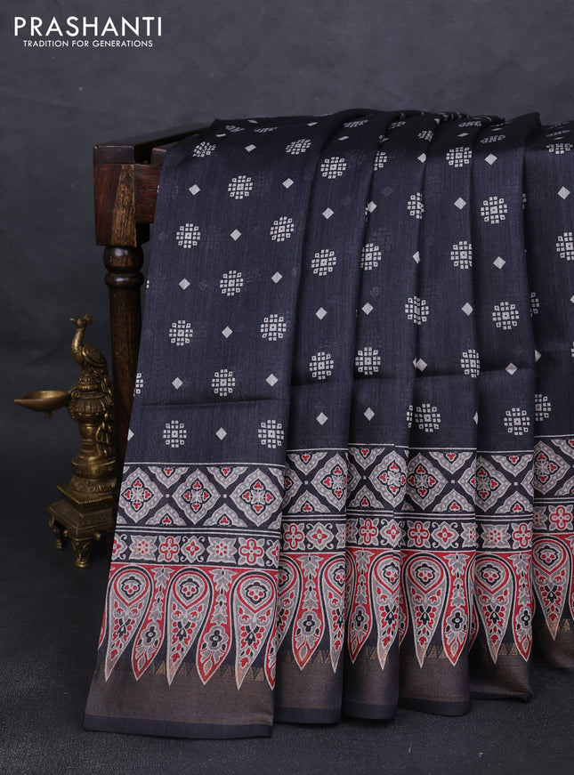 Munga tussar silk saree black with allover butta prints and ajrakh printed pallu
