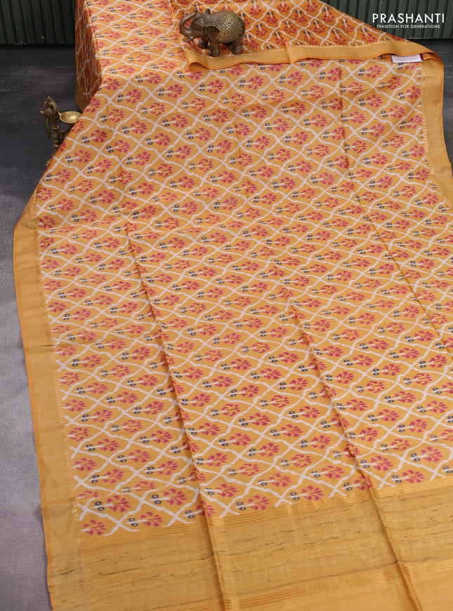 Munga tussar silk saree mustard yellow with allover patola prints and zari woven border