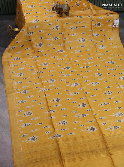 Munga tussar silk saree yellow with allover ikat butta prints and zari woven border