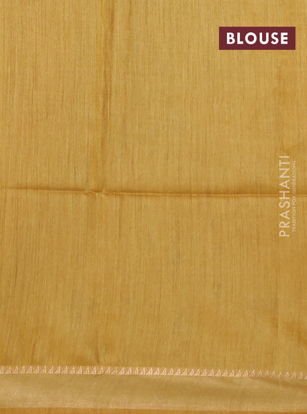 Munga tussar silk saree yellow with allover ikat butta prints and zari woven border