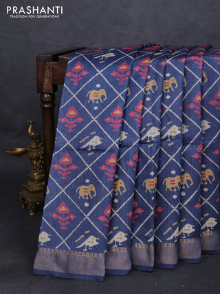 Munga tussar silk saree navy blue with allover patola prints and zari woven border