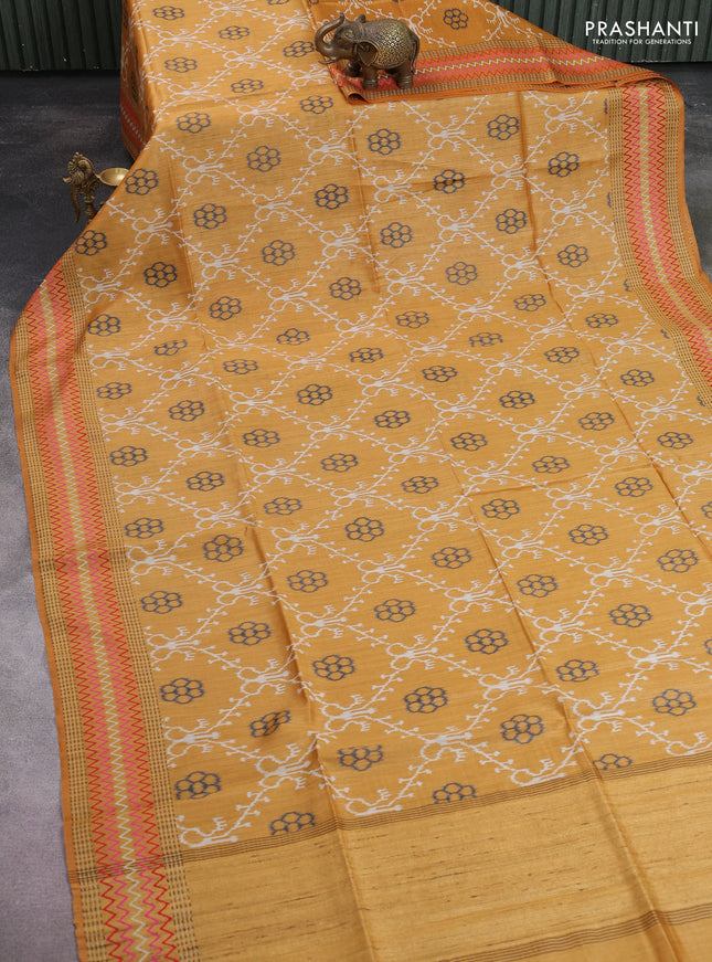 Munga tussar silk saree mustard yellow with allover patola prints and thread woven border