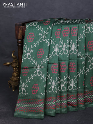 Munga tussar silk saree green with allover patola prints and thread woven border
