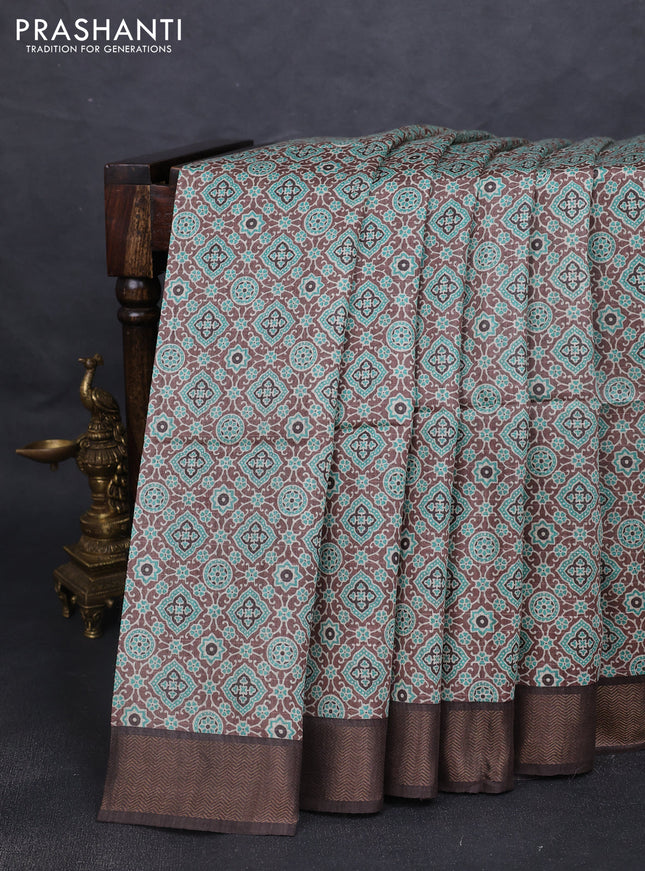 Munga tussar silk saree pastel brown teal blue and coffee brown with allover ajrakh prints and zari woven border