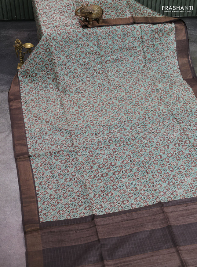 Munga tussar silk saree pastel brown teal blue and coffee brown with allover ajrakh prints and zari woven border