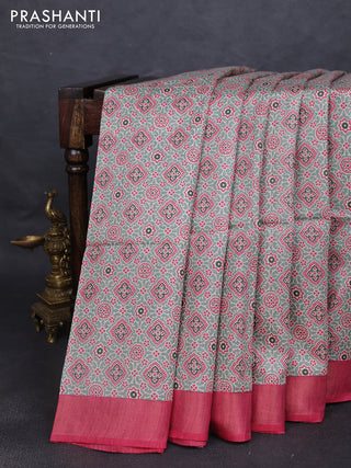 Munga tussar silk saree pastel green and pink with allover ajrakh prints and zari woven border