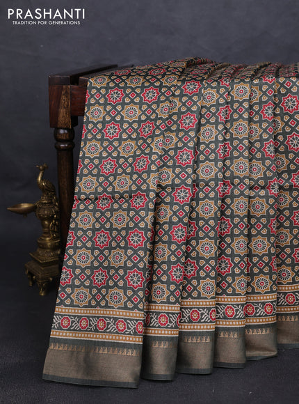 Munga tussar silk saree sap green shade with allover ajrakh prints and zari woven border