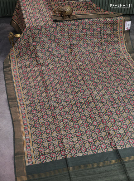 Munga tussar silk saree sap green shade with allover ajrakh prints and zari woven border