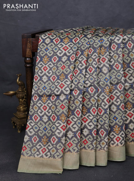 Munga tussar silk saree grey and pastel green with allover ikat prints and zari woven border