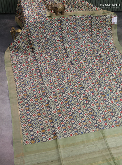 Munga tussar silk saree grey and pastel green with allover ikat prints and zari woven border