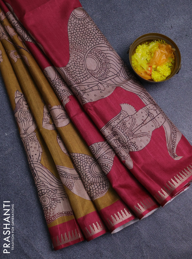 Semi matka saree dark mustard and dark pink with allover kalamkari prints and temple design zari woven border