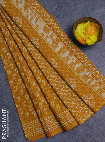 Jaipur cotton saree mustard yellow with allover dabu prints and printed border