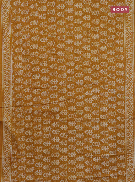 Jaipur cotton saree mustard yellow with allover dabu prints and printed border