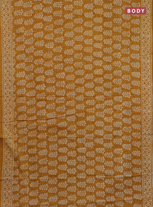 Jaipur cotton saree mustard yellow with allover dabu prints and printed border
