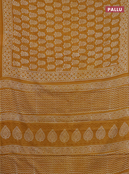 Jaipur cotton saree mustard yellow with allover dabu prints and printed border