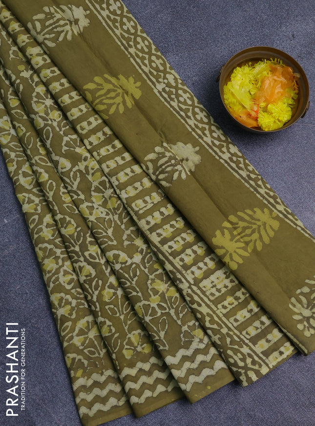 Jaipur cotton saree mehendi green with allover batik prints and printed border