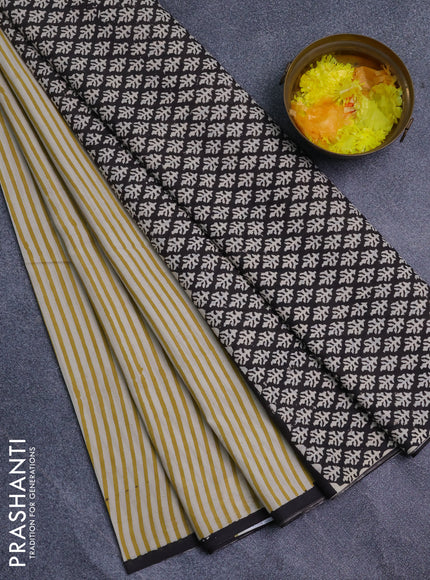 Jaipur cotton saree off white and black with allover stripe pattern and printed border