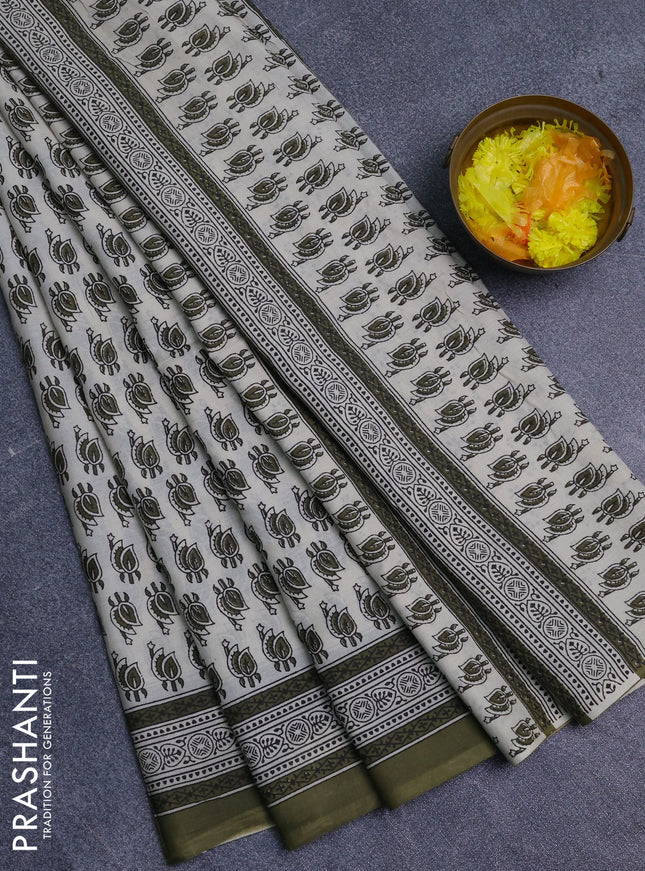 Jaipur cotton saree cream and mehendi green with allover prints and printed border