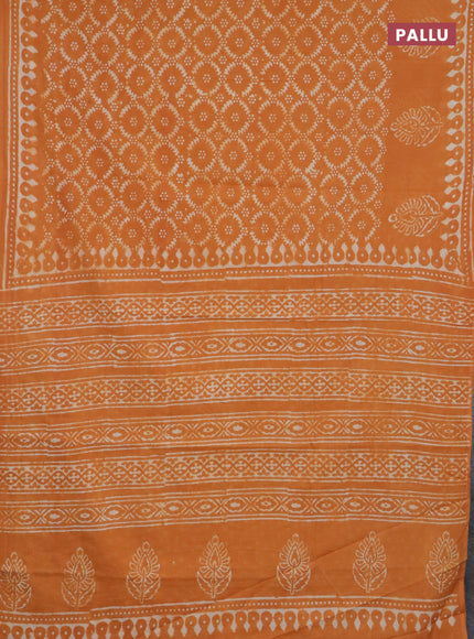 Jaipur cotton saree orange with allover batik prints and printed border