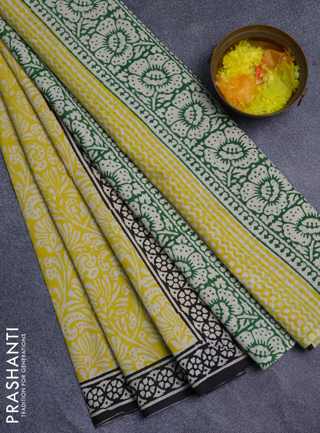 Jaipur cotton saree yellow and black with allover prints and printed border