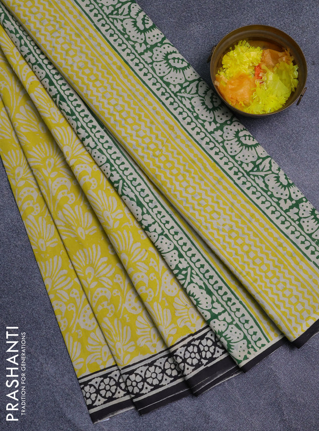 Jaipur cotton saree yellow and black with allover prints and printed border