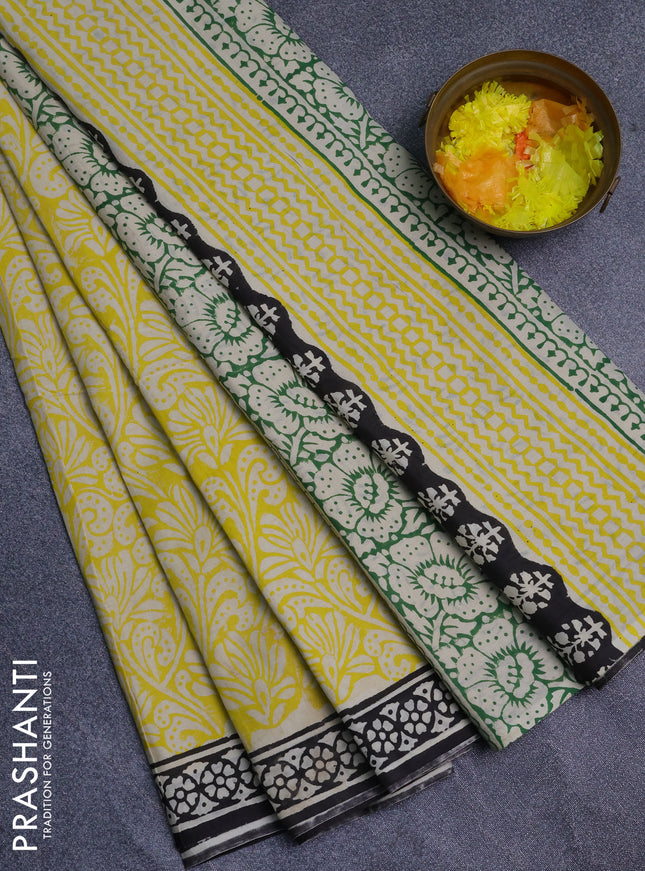 Jaipur cotton saree yellow and black with allover prints and printed border