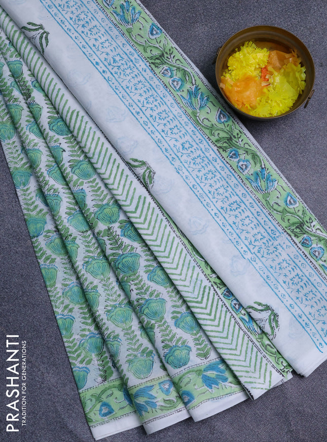 Jaipur cotton saree light green and off white with allover prints and printed border
