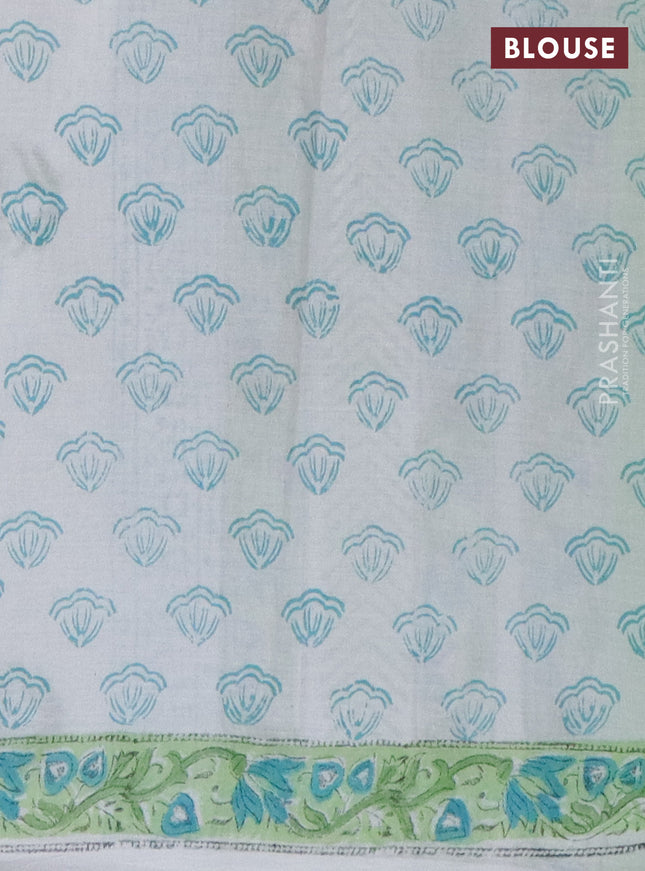 Jaipur cotton saree light green and off white with allover prints and printed border