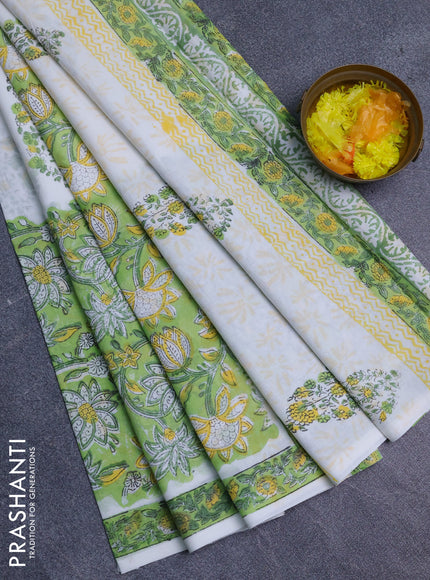 Jaipur cotton saree light green and off white with allover prints and printed border