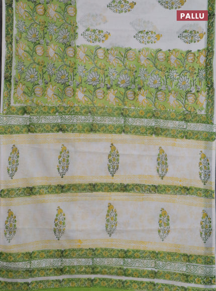 Jaipur cotton saree light green and off white with allover prints and printed border