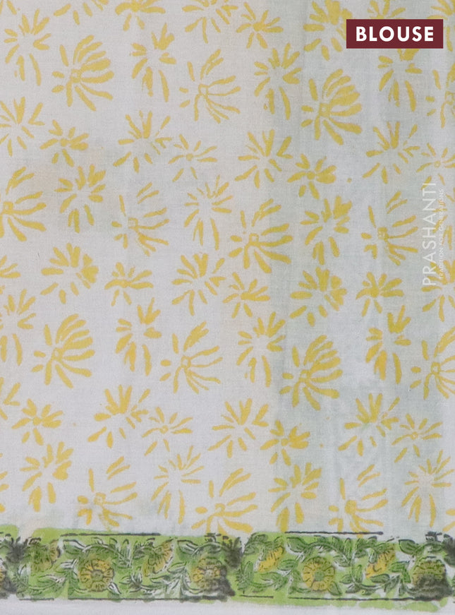 Jaipur cotton saree light green and off white with allover prints and printed border