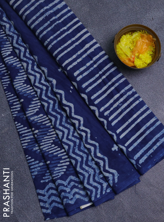 Jaipur cotton saree indigo blue with allover dabu prints and printed border