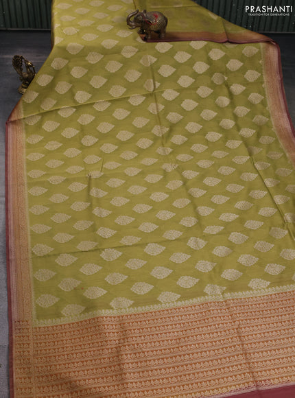 Banarasi silk cotton saree mehendi green and brown with zari woven buttas and woven border