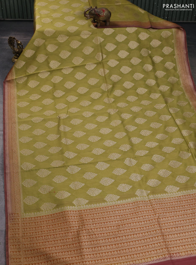 Banarasi silk cotton saree mehendi green and brown with zari woven buttas and woven border