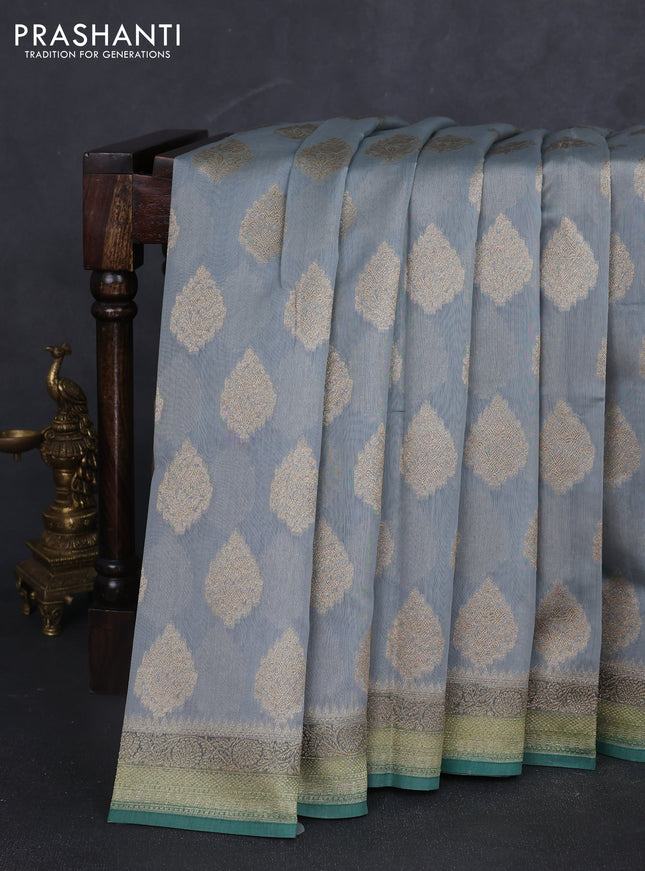 Banarasi silk cotton saree grey and green shade with zari woven buttas and woven border