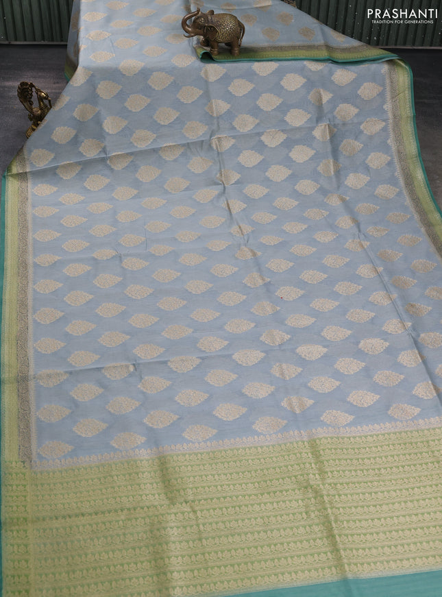 Banarasi silk cotton saree grey and green shade with zari woven buttas and woven border