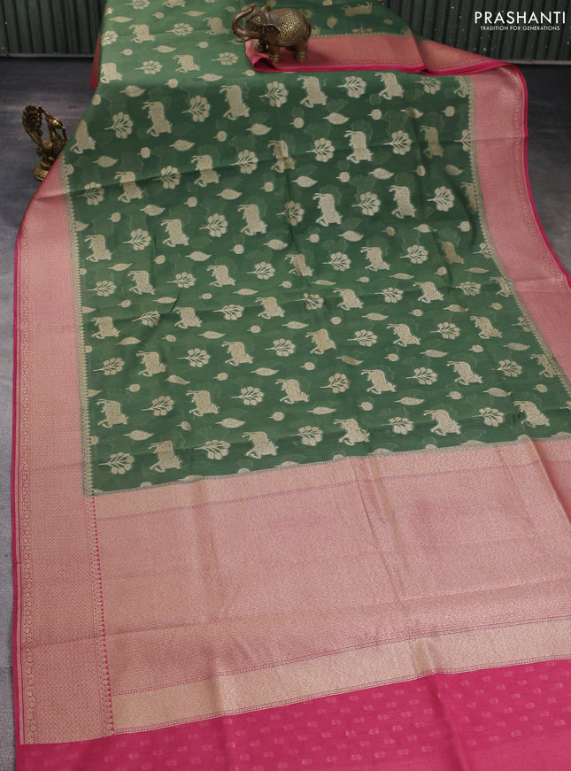 Banarasi silk cotton saree green and pink with zari woven buttas and woven border