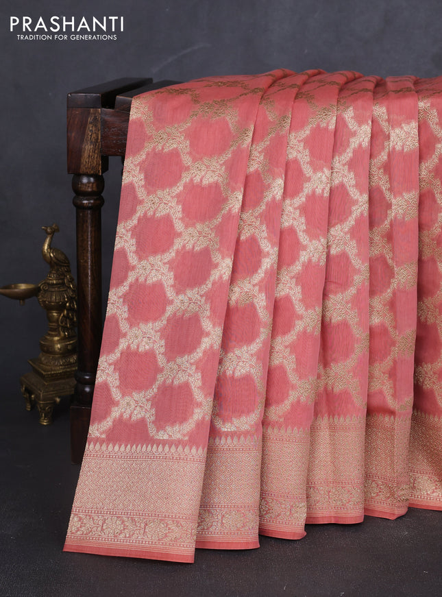 Banarasi silk cotton saree peach pink with allover zari weaves and zari woven border