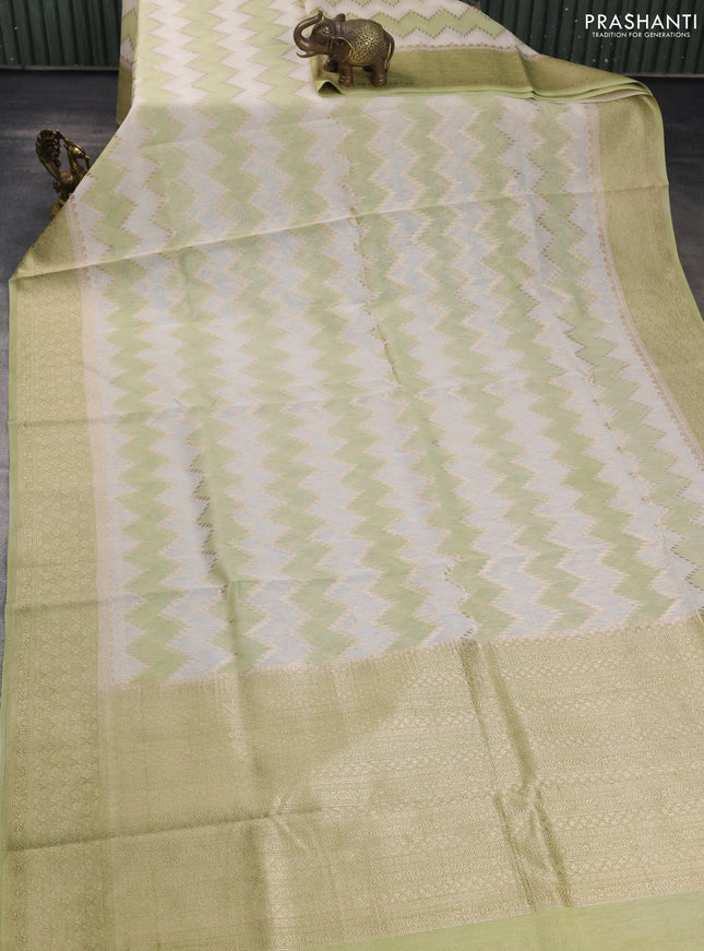 Banarasi silk cotton saree cream and pista green with allover zari weaves and zari woven border