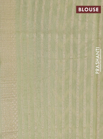Banarasi silk cotton saree cream and pista green with allover zari weaves and zari woven border