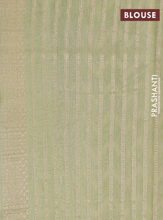 Banarasi silk cotton saree cream and pista green with allover zari weaves and zari woven border